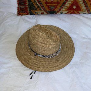 Men's kwai braided straw hat with adjustable black and white chin cord L/XL
